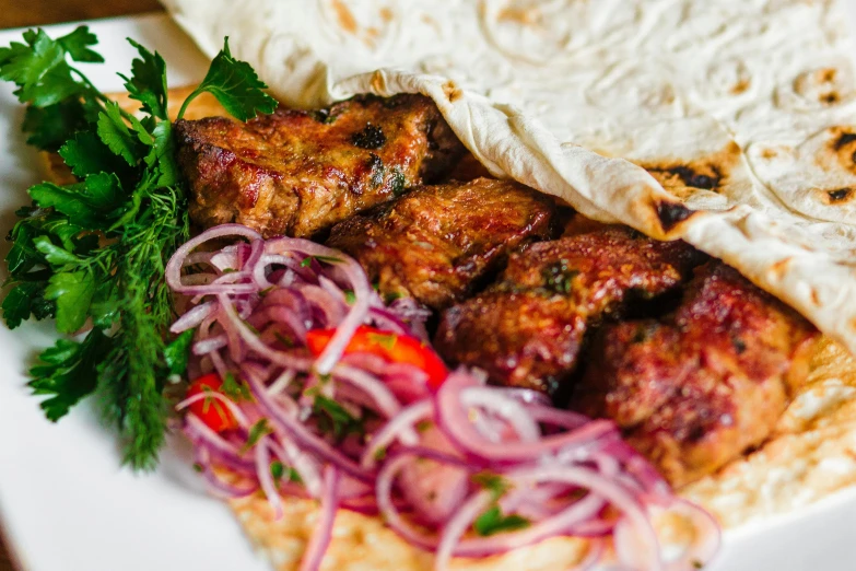 a close up of a plate of food on a table, by Niko Henrichon, hurufiyya, kebab, background image, recipe, pink