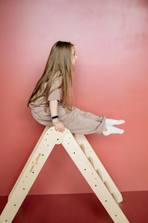 a little girl sitting on top of a wooden ladder, inspired by Sarah Lucas, trending on pexels, aestheticism, flat triangles, softplay, powerful woman sitting in space, profile image