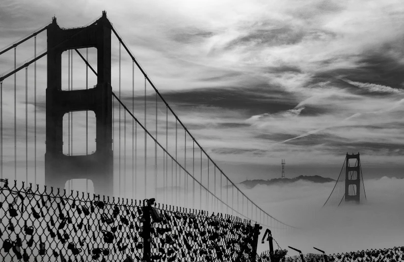 a black and white photo of the golden gate bridge, by Dave Melvin, pexels contest winner, surrealism, fence, city morning, mechabot, a city in the clouds