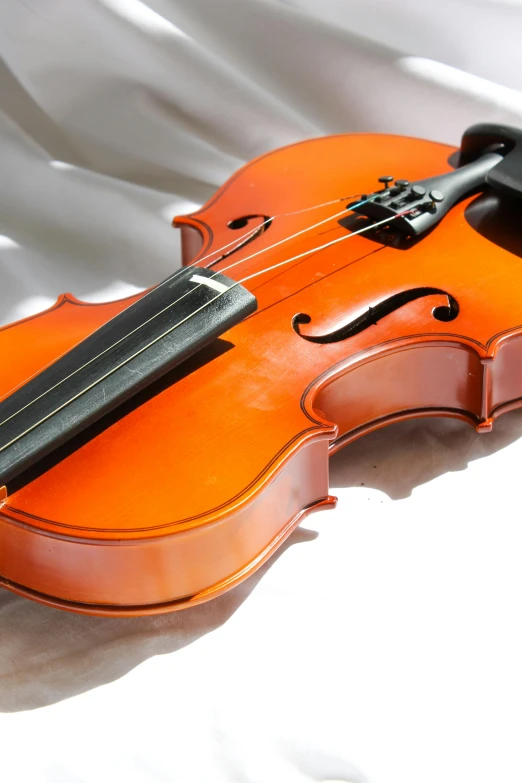 a violin sitting on top of a white sheet, profile pic, promo image, tournament, thumbnail