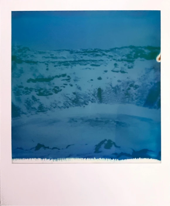 a polar bear standing on top of a snow covered field, a polaroid photo, by Nathalie Rattner, color field, pools of water, chromostereopsis, (snow)