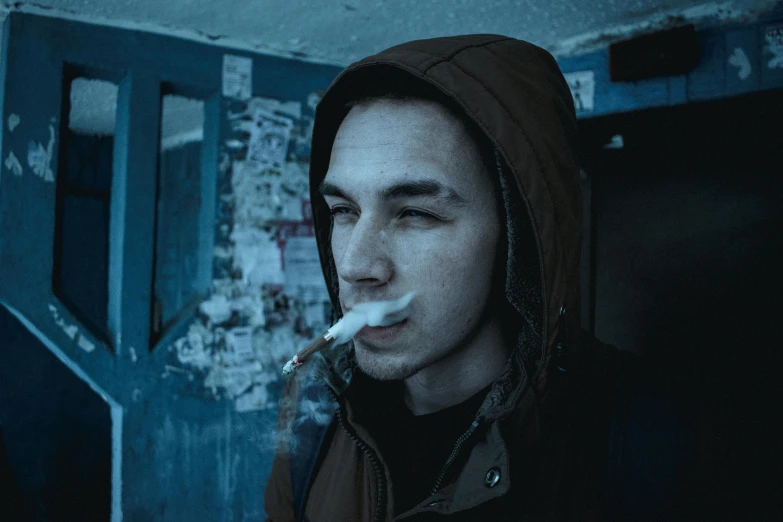a man in a hoodie smoking a cigarette, inspired by Elsa Bleda, pexels contest winner, avatar image, thin young male, grunged up, childish