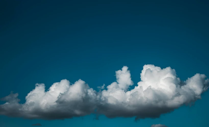 a couple of clouds that are in the sky, by Adam Marczyński, unsplash, minimalism, high detail photo, conor walton, unsplash 4k, hd footage