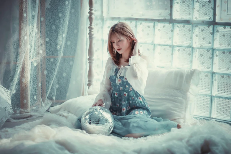 a little girl sitting on a bed with a disco ball, inspired by Elsa Bleda, trending on pixabay, pale cyan and grey fabric, ulzzang, cottagecore hippie, winter princess