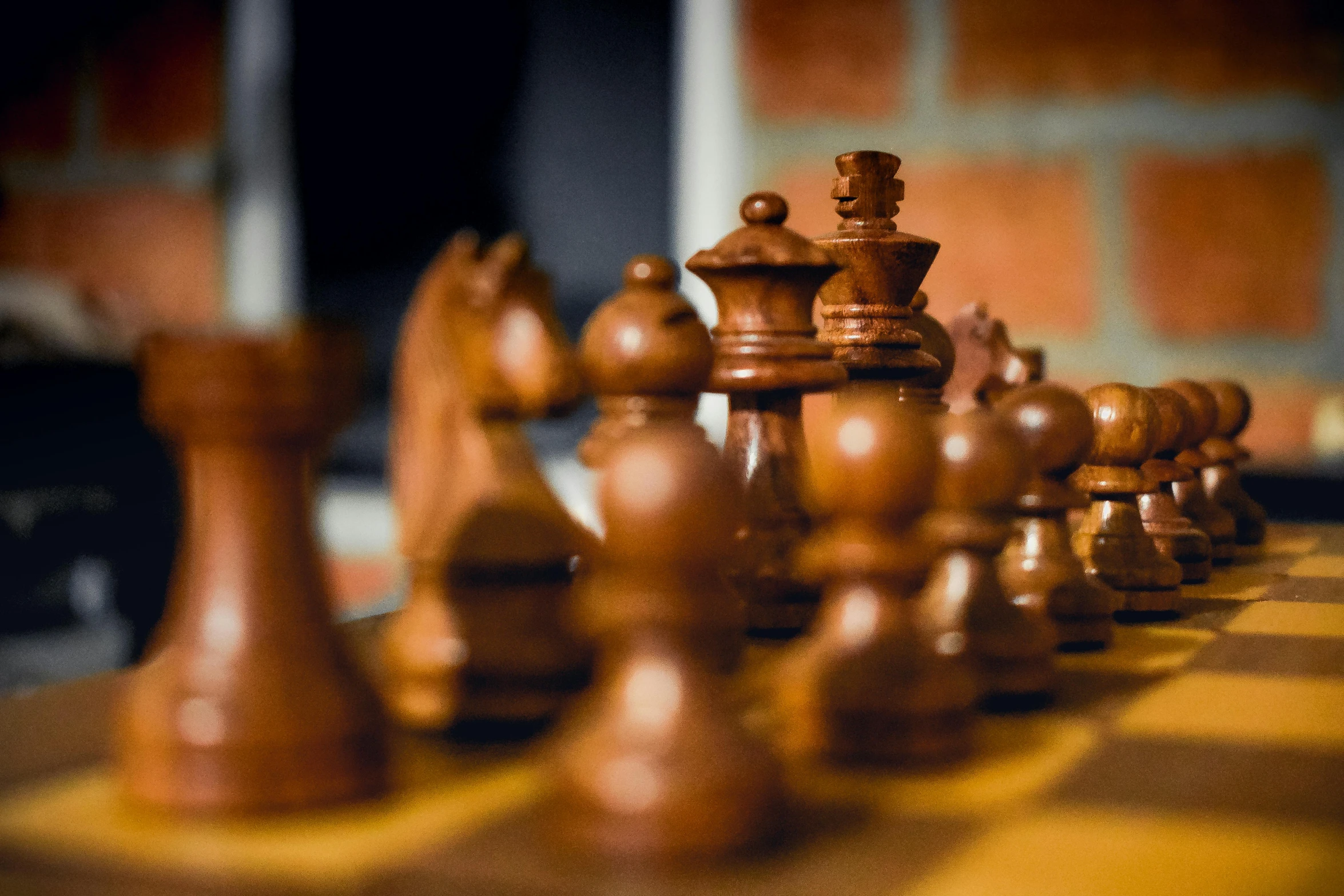 a group of chess pieces sitting on top of a chess board, by Daniel Lieske, pexels contest winner, on a wooden tray, close - up profile, thumbnail, brown