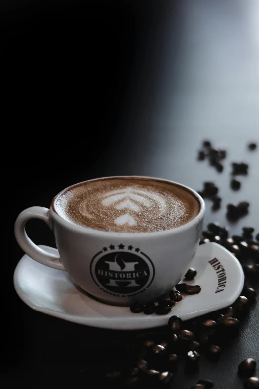 a cup of coffee sitting on top of a saucer