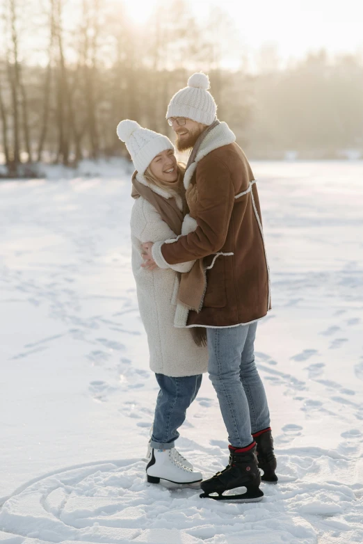 a man and woman kissing in the snow, trending on pexels, wide full body, two men hugging, brown, scandinavian