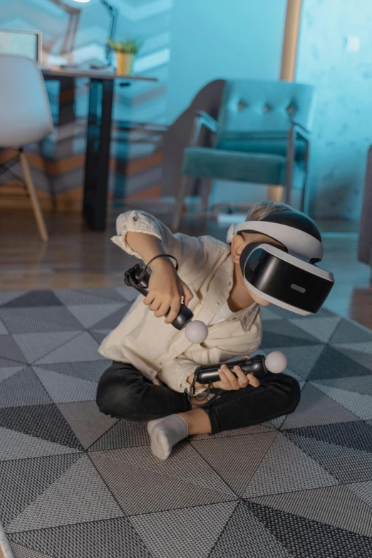 a man sitting on the floor playing a video game, oculus quest 2, little kid, promo image, in an action pose