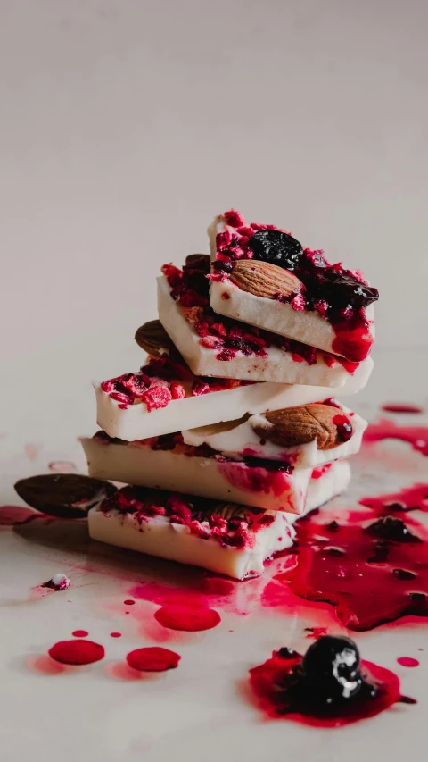 a close up of a piece of food on a table, by Nick Fudge, pexels, rococo, made of candy, maroon, healthy, vanilla