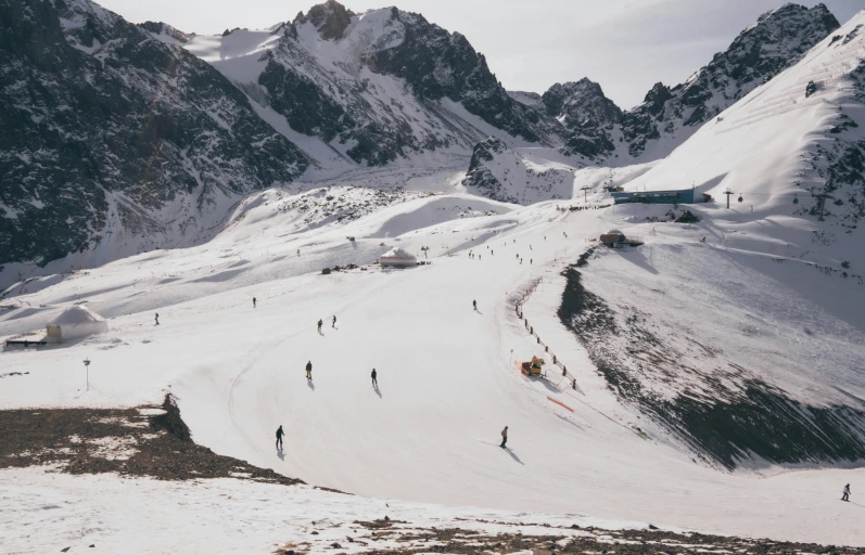 a group of people riding skis down a snow covered slope, pexels contest winner, hurufiyya, complex and detailed, 90s photo, tourist destination, georgic