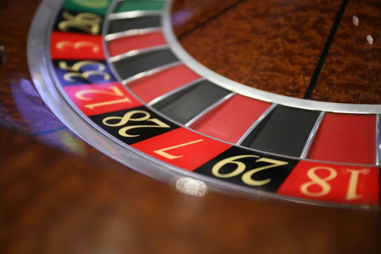 a close up of a roulet wheel on a table, by Daniel Lieske, unsplash, online casino logo, 15081959 21121991 01012000 4k, multi - coloured, brown