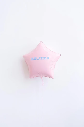 a pink star shaped balloon sitting on top of a table, by Ren Hang, unsplash, isolate, label, bl, ulzzang