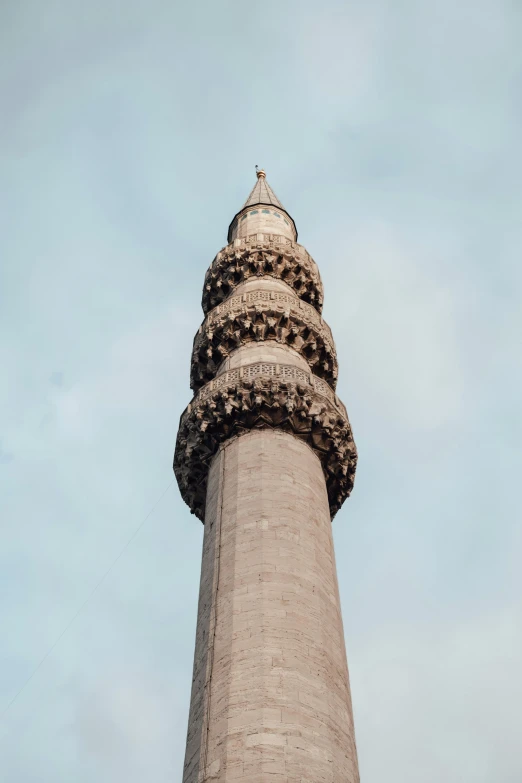 a tall tower with a clock on top of it, inspired by Osman Hamdi Bey, trending on unsplash, hurufiyya, ventilation shafts, gray, front profile, ivory towers