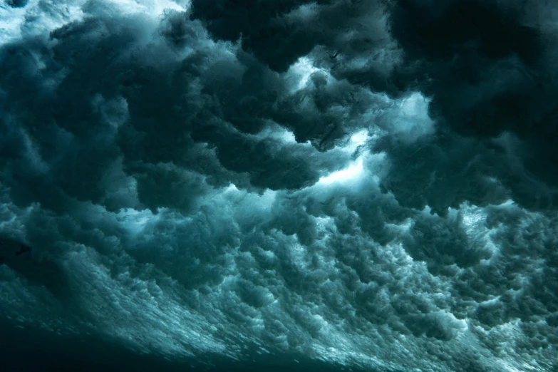 a large body of water under a cloudy sky, an album cover, by Daniel Seghers, pexels contest winner, turbulent sea, undersea, quixel megascan, teal sky