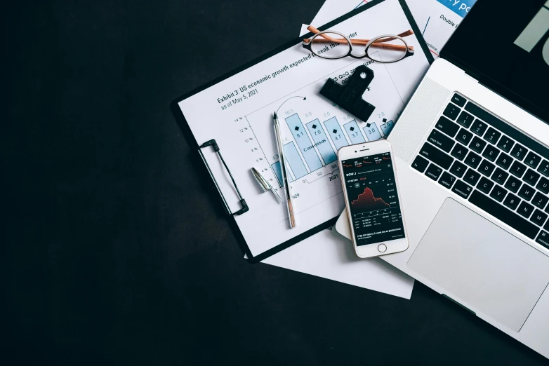 a laptop computer sitting on top of a desk next to a cell phone, a picture, trending on unsplash, analytical art, maths, flatlay, dark. no text, graphs