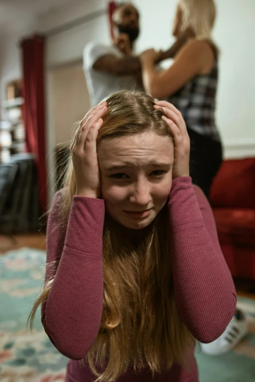 a young girl holding her head in her hands, happening, sydney sweeney, frustrated expression, ap press photo, high quality picture