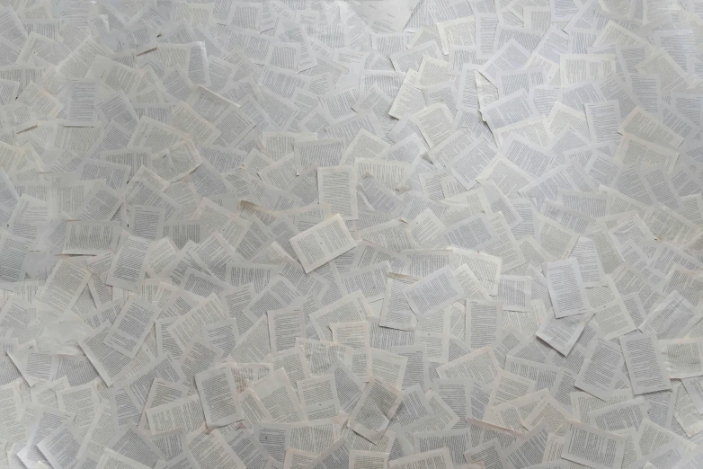 a pile of newspaper sitting on top of a table, an album cover, by Rachel Whiteread, unsplash, conceptual art, dystopian floor tile texture, flying books, silver，ivory, 62 x 47 inches
