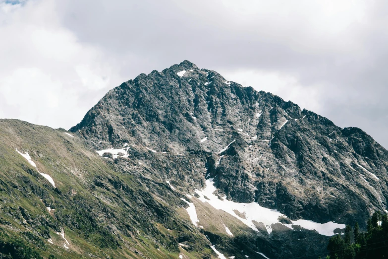 a group of sheep standing on top of a lush green hillside, an album cover, by Matthias Weischer, unsplash, with a snowy mountain and ice, high quality product image”