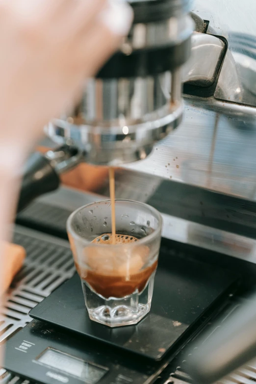 a person is making a cup of coffee, melbourne, highly upvoted, extremely polished, in liquid