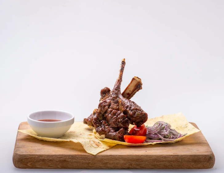 a piece of meat sitting on top of a wooden cutting board, a picture, offering a plate of food, mutton chops, greek ameera al taweel, plated arm