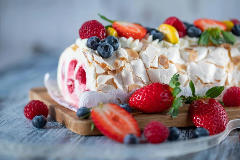 a cake sitting on top of a wooden cutting board, by Daniel Lieske, shutterstock, rococo, berries, marshmallow, 🎀 🧟 🍓 🧚, sea of parfait