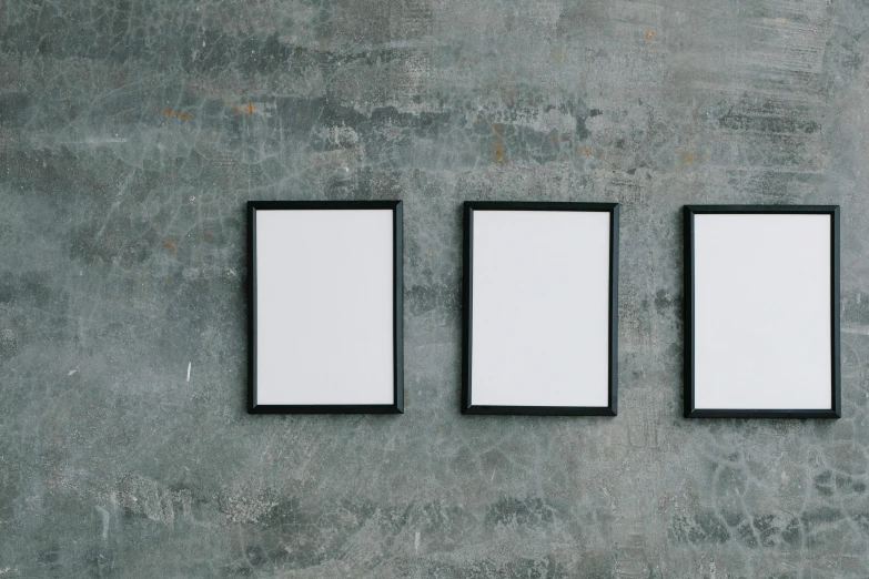three empty picture frames hanging on a wall, by Adam Rex, trending on unsplash, charcoal painting, whiteboards, diptych, eight eight eight