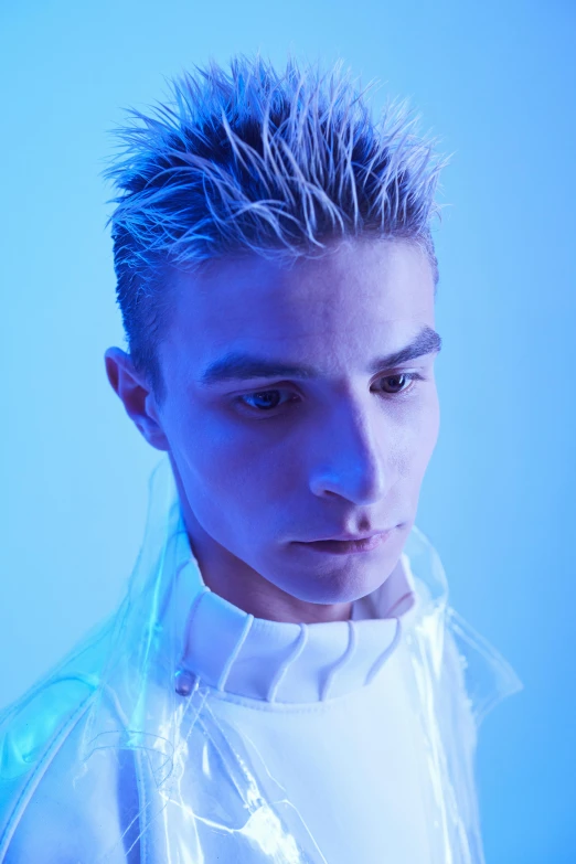 a close up of a person wearing a white shirt, an album cover, inspired by Kristian Kreković, blue spiky hair, cybernetic glowing, male model, slide show