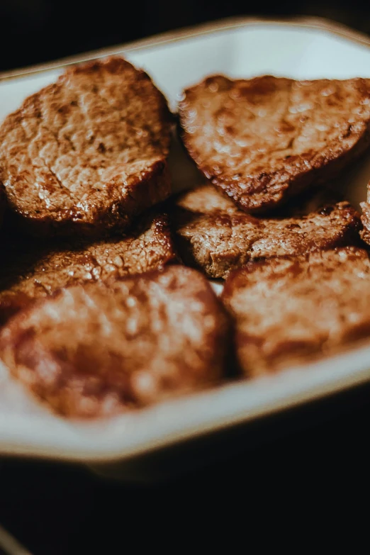 a close up of a plate of food on a table, round thighs, 6 pack, thumbnail, beef