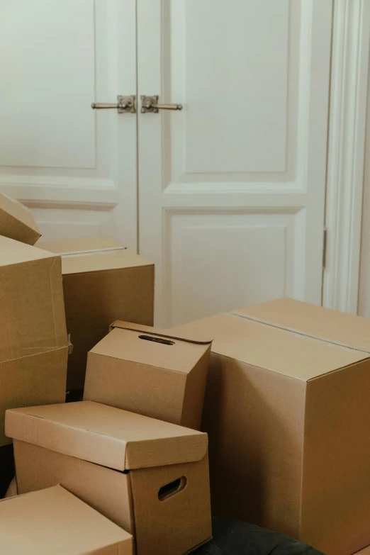 a pile of cardboard boxes sitting on the floor, selling insurance, sydney, background image, cupboards