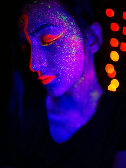 a woman with black light on her face, a picture, trending on pexels, neo-fauvism, ((neon colors)), psychedelic and glittering, light red and deep blue mood, glowing lights!!