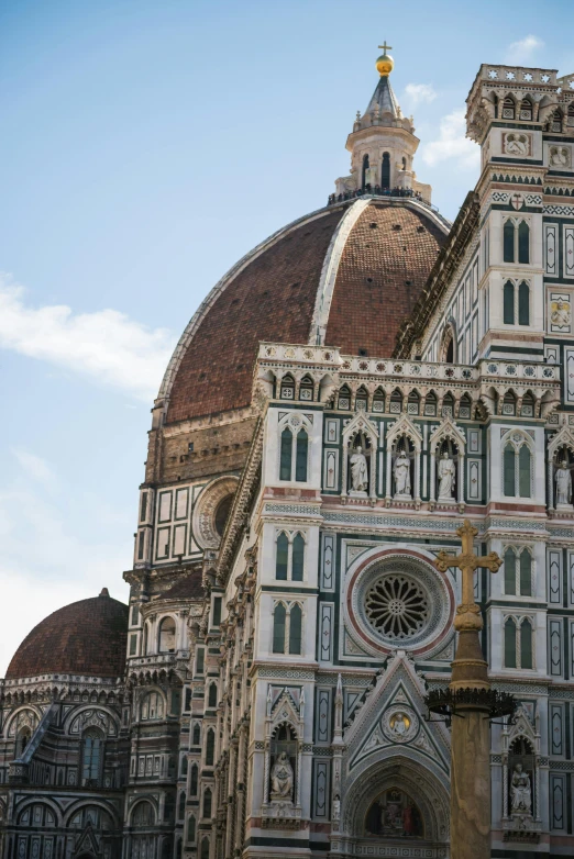 a large cathedral with a clock on top of it, inspired by Michelangelo Buonarotti, fan favorite, florence, mediterranean architecture, ornate architecture