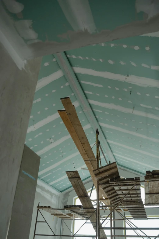 a room that has some scaffolding on the ceiling, taken in the late 2000s, foam, sloped site, closeup!!!!!