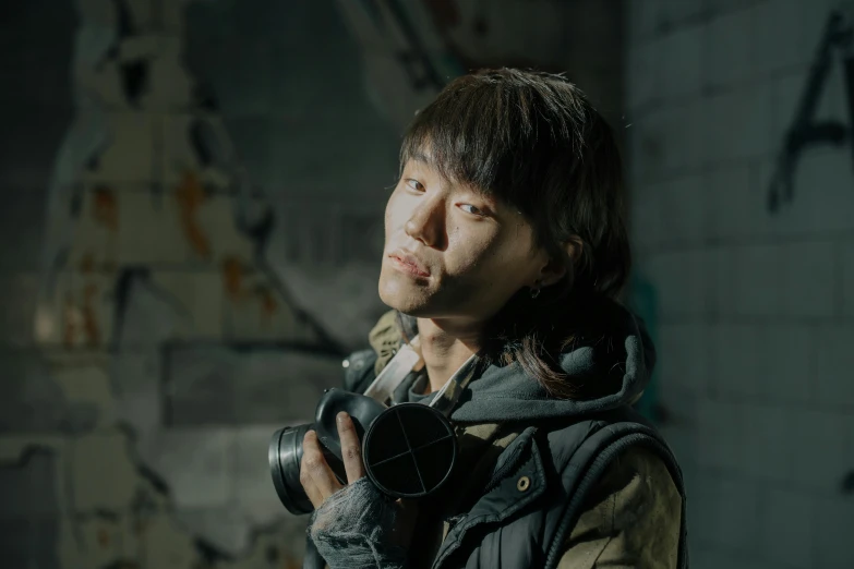 a woman holding a camera in a dark room, a character portrait, shin hanga, south korean male, in a post apocalyptic setting, [ theatrical ], professional profile picture