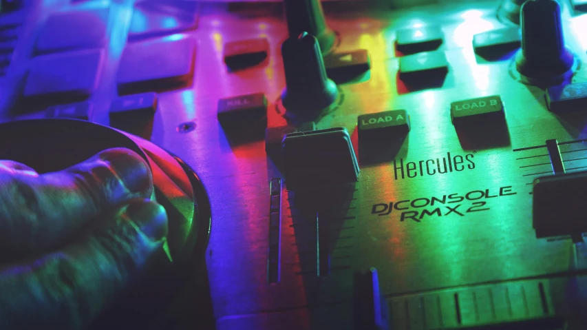 a close up of a mixer with headphones on, an album cover, by Jeff Miracola, trending on pexels, hyperrealism, dreamy colorful cyberpunk colors, hercules, controller deck, micro - hurricane