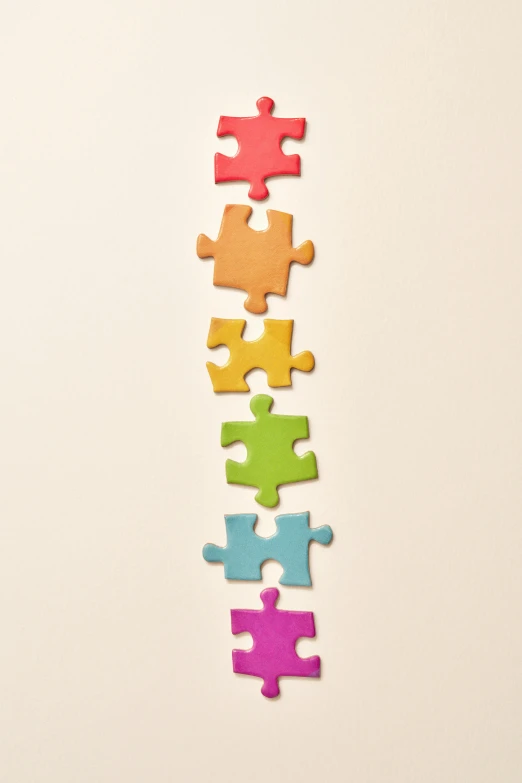 multicolored puzzle pieces arranged on top of each other, by Daniel Seghers, jen atkin, really long, digital image, toys