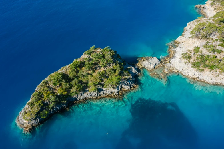 a small island in the middle of a body of water, pexels contest winner, hurufiyya, picton blue, turkey, clear blue water, thumbnail