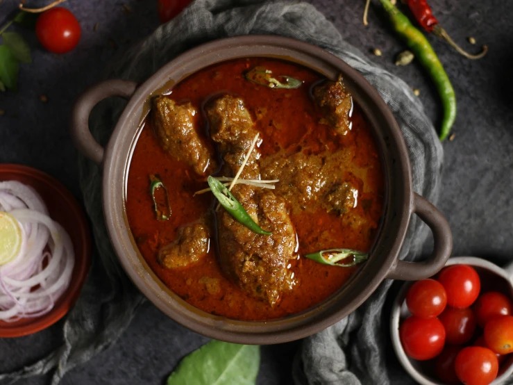 a close up of a bowl of food on a table, inspired by John Steuart Curry, pexels contest winner, hurufiyya, malayalis attacking, goat, profile image, high quality product image”