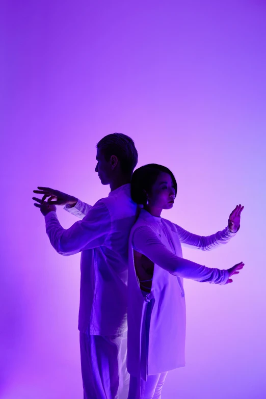 a couple of people standing next to each other, an album cover, by Tadashi Nakayama, unsplash, conceptual art, purple light, dance, doing an elegant pose over you, showstudio