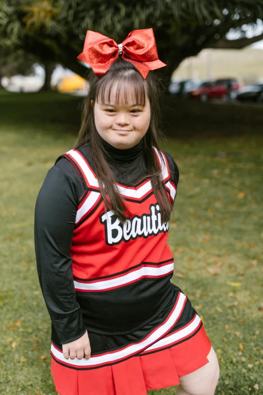 a girl in a cheer uniform posing for a picture, profile image, basia tran, no teeth, promo image