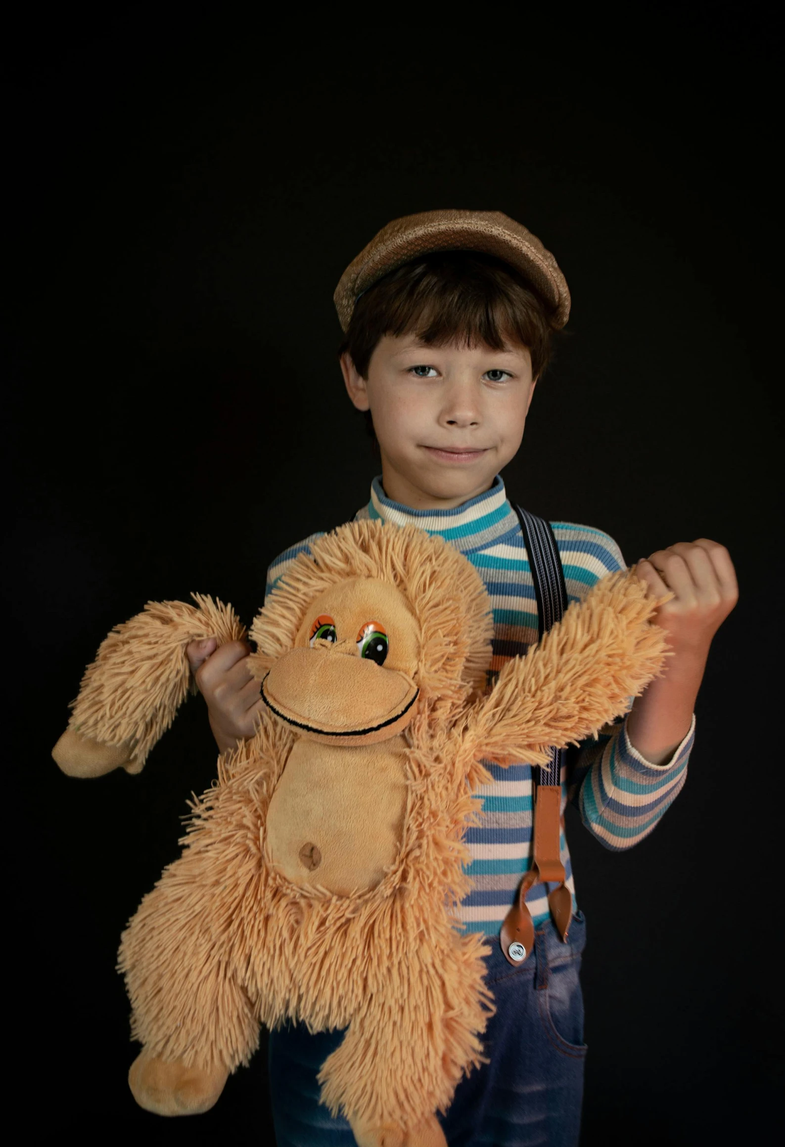 a little boy that is holding a teddy bear, an album cover, inspired by George Barker, pexels contest winner, subject= chimp, carrying a saddle bag, animatronic, attractive