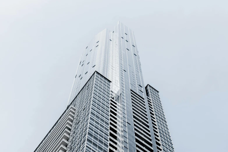 a very tall building with a lot of windows, pexels contest winner, minimalism, melbourne, foster and partners, three - quarter view, toronto city