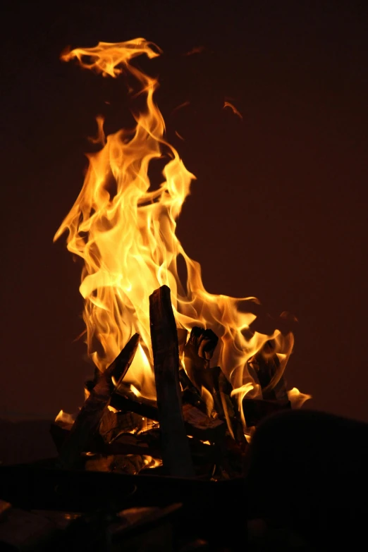 a close up of a fire in the dark, by Jan Rustem, vanilla, fire and brimstone, but can only be burned, tall