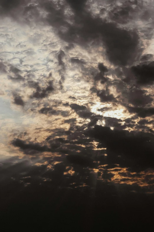 a person flying a kite under a cloudy sky, by Jan Tengnagel, ((sunset)), black clouds, detailed clouds, panorama view of the sky