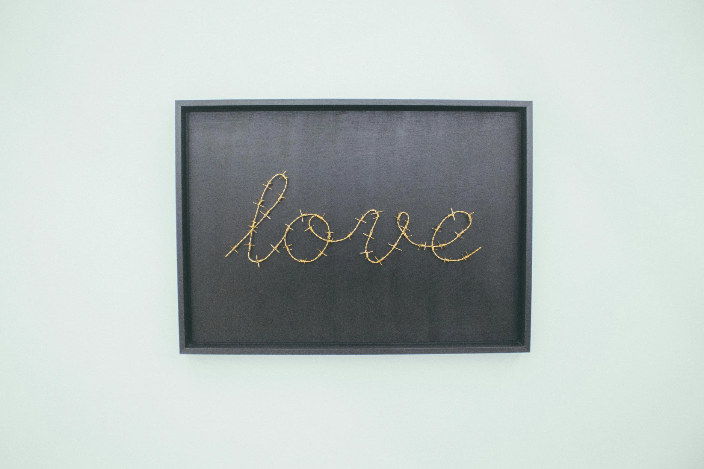 a picture of a picture of a picture of a picture of a picture of a picture of a picture of a picture of a picture of a, a cross stitch, inspired by Antoni Tàpies, pexels, folk art, neon wires, love craft, carbon black and antique gold, flowing lettering