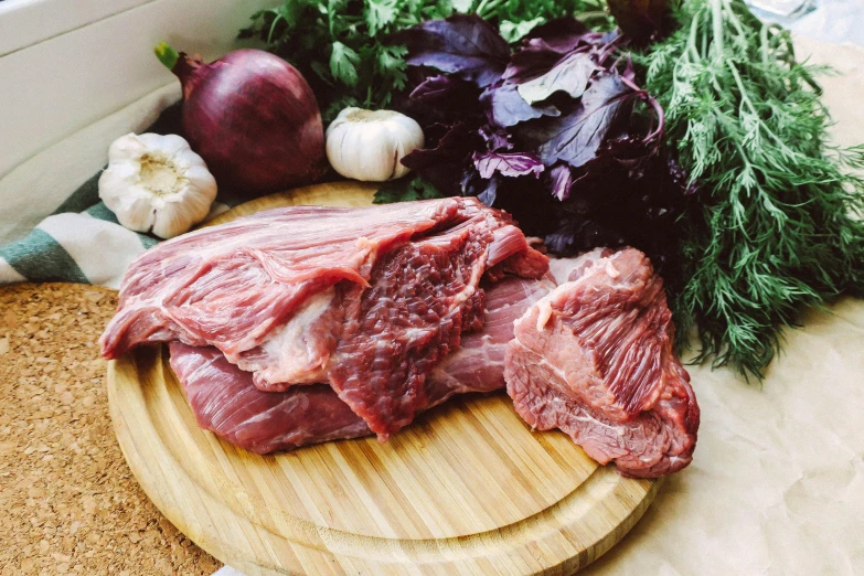 a wooden cutting board topped with meat and vegetables, by Julia Pishtar, fair skinned, mutton chops, 6 pack, meat with veins