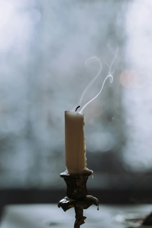 a candle sitting on top of a table next to a window, a picture, unsplash, romanticism, wispy tendrils of smoke, ignant, deteriorated, candle dripping white wax