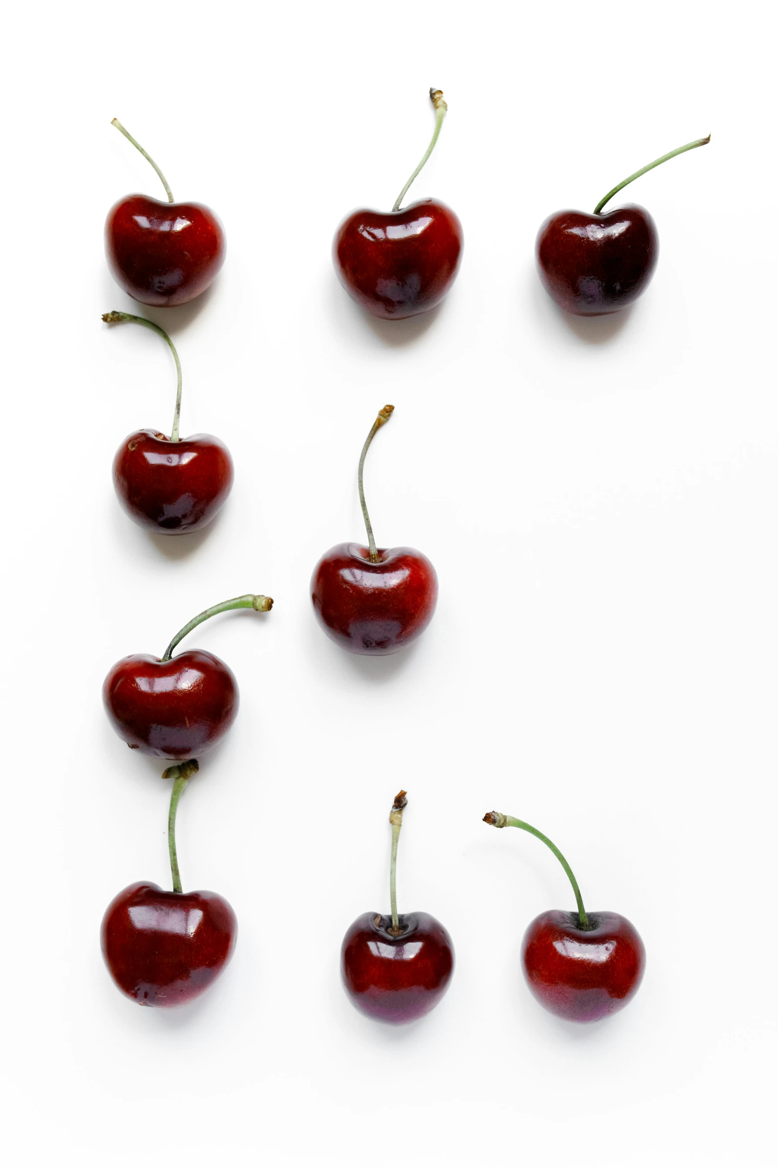 a number of cherries on a white surface, by Peter Churcher, unsplash, pop art, 2 5 6 x 2 5 6 pixels, peter hurley, giant cherry trees, f/8.0