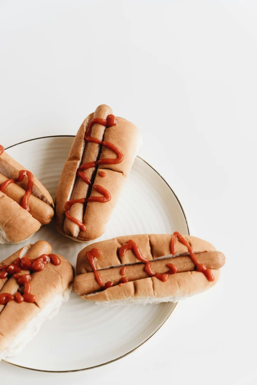 a white plate topped with three hot dogs covered in ketchup, a portrait, unsplash, 6 pack, kek, background image, cutout