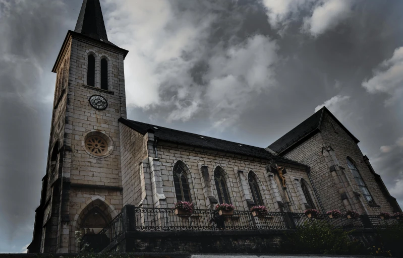 a church with a clock tower on a cloudy day, an album cover, by Raphaël Collin, pexels contest winner, romanesque, halloween, french village exterior, front view dramatic, marilyn church h