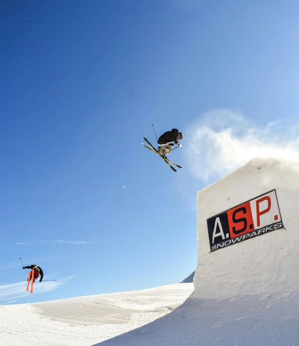 a man flying through the air while riding skis, by Sebastian Spreng, unsplash contest winner, graffiti, alessio albi, panels, 4 k ”, alp